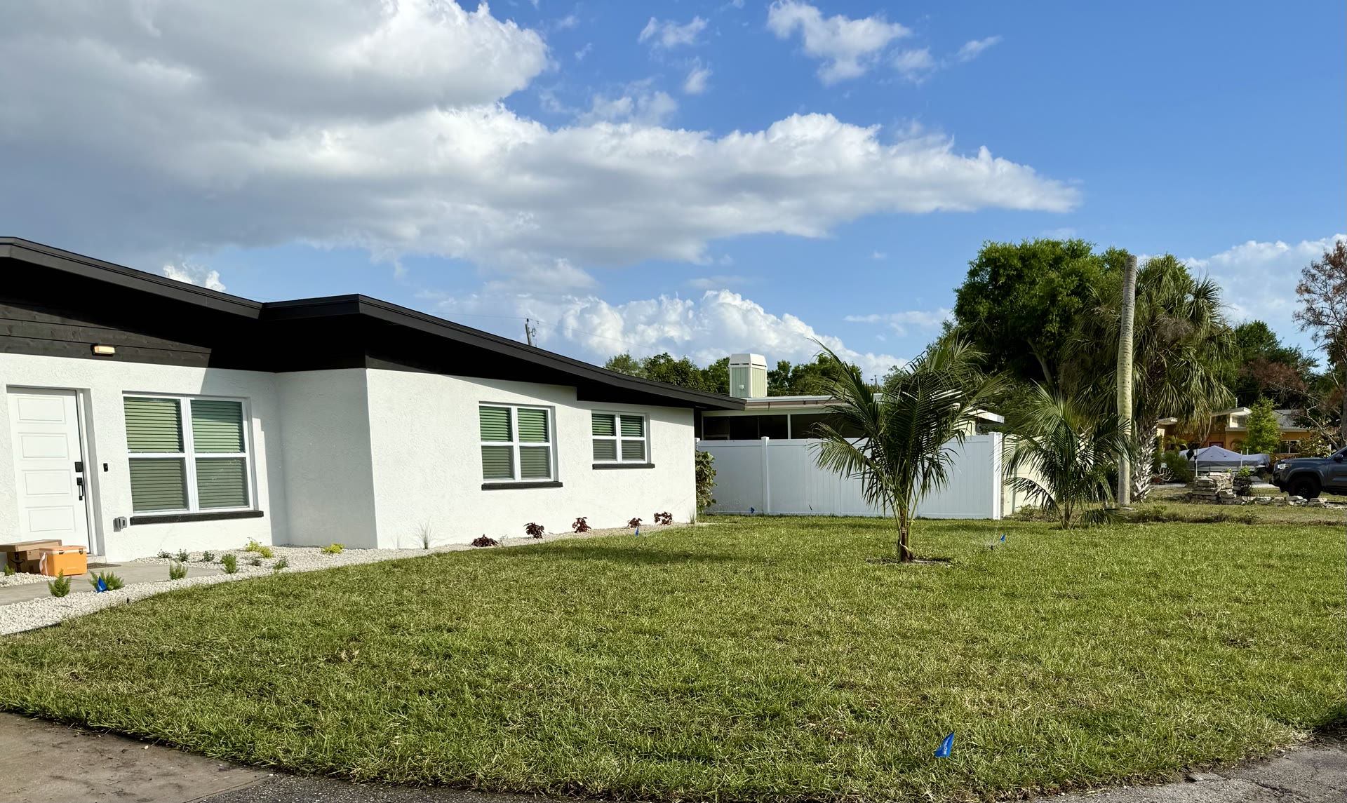 Clean residential property with fresh lawn and newly landscaped yard